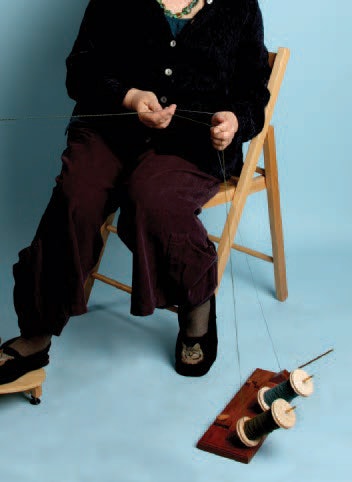 Judith-Mackenzie-spins-with-one-foot