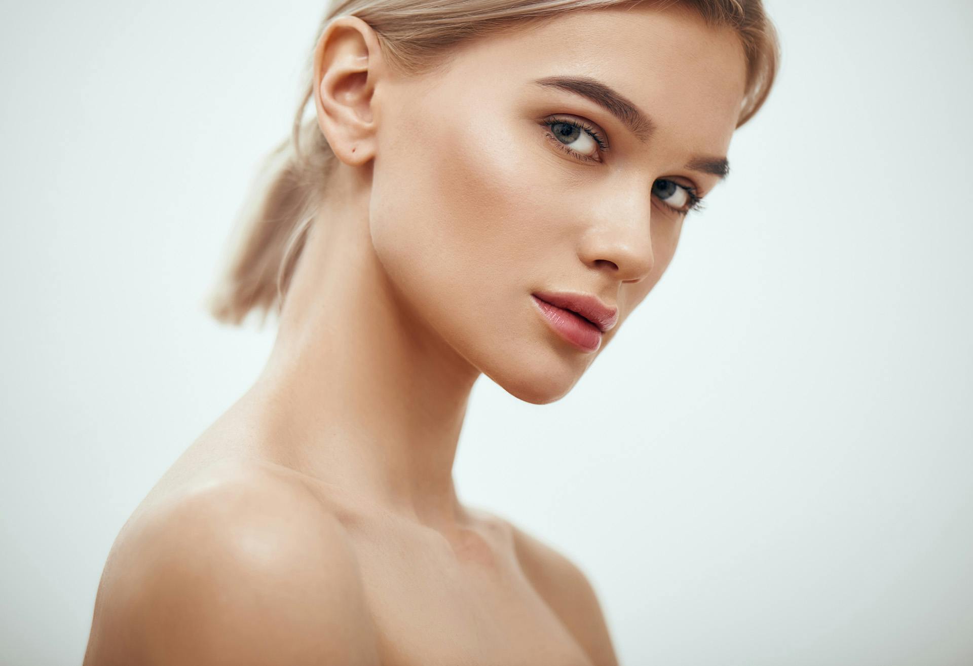 Woman looking sidelong at the camera