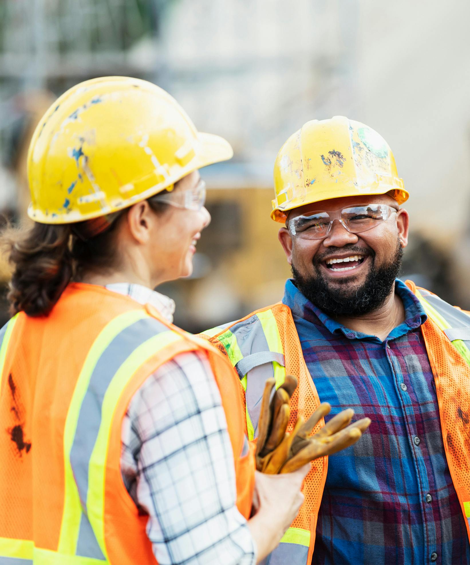 Construction workers laughing