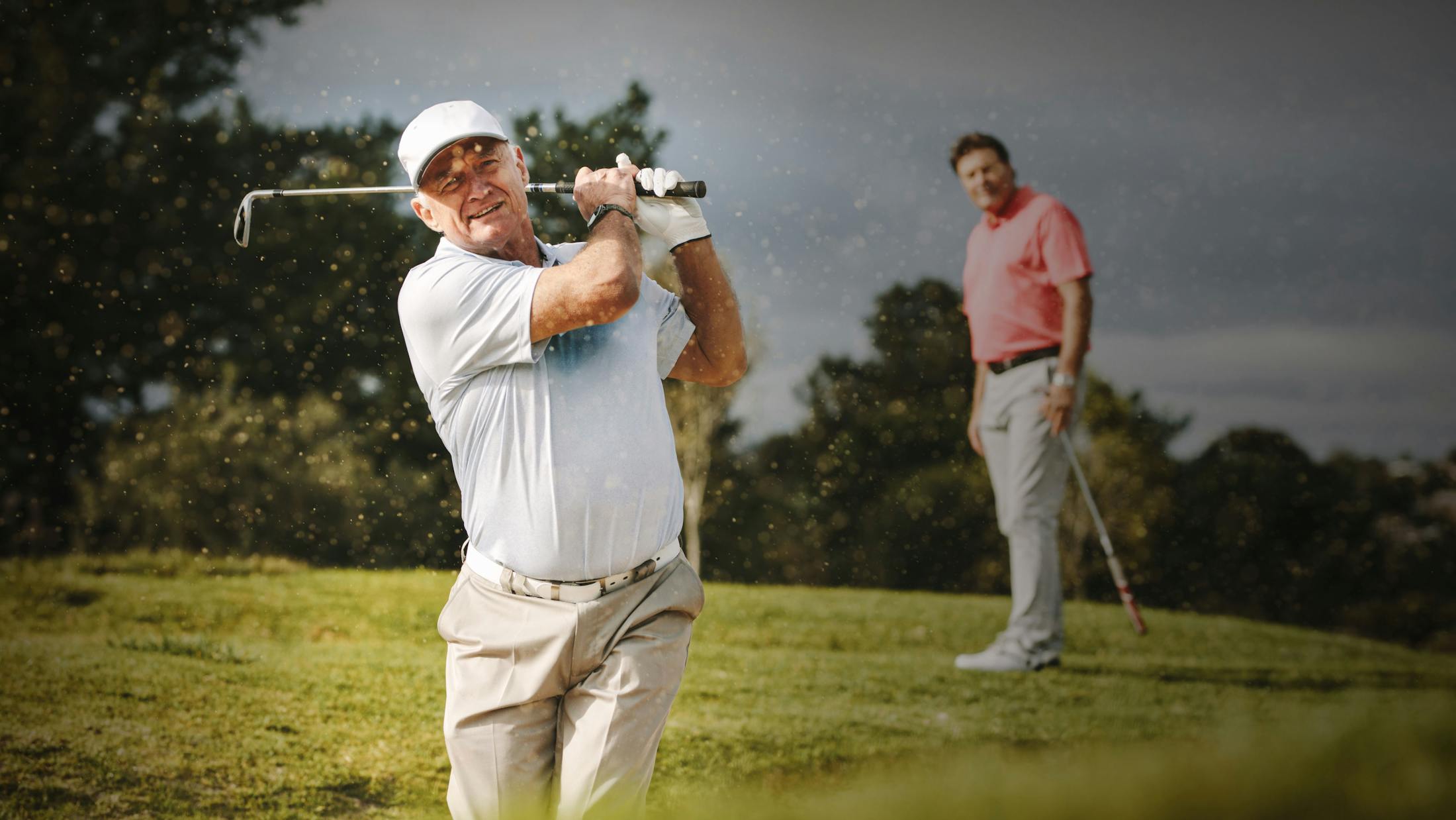 Two men golfing.