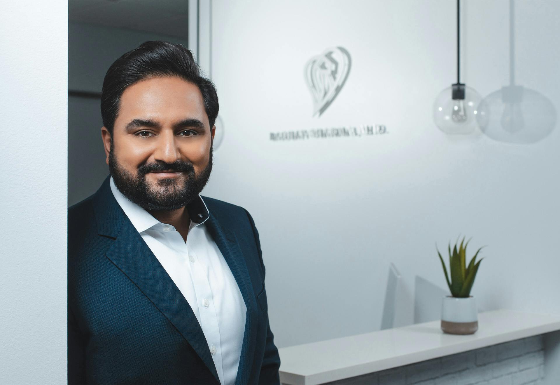 Doctor Sharma Smiling at the Camera