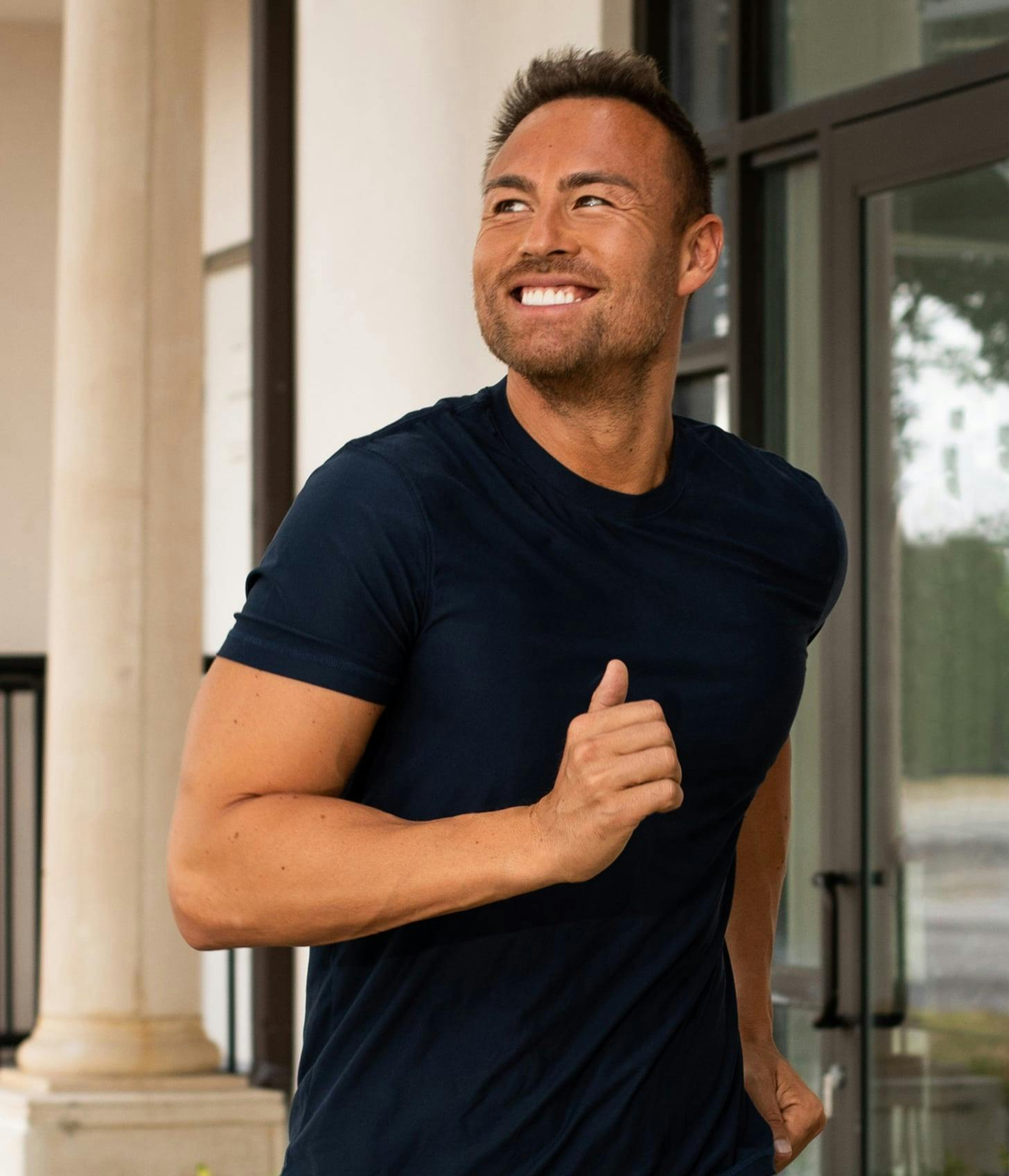 Healthy Man with a Healthy Heart Smiling and Running