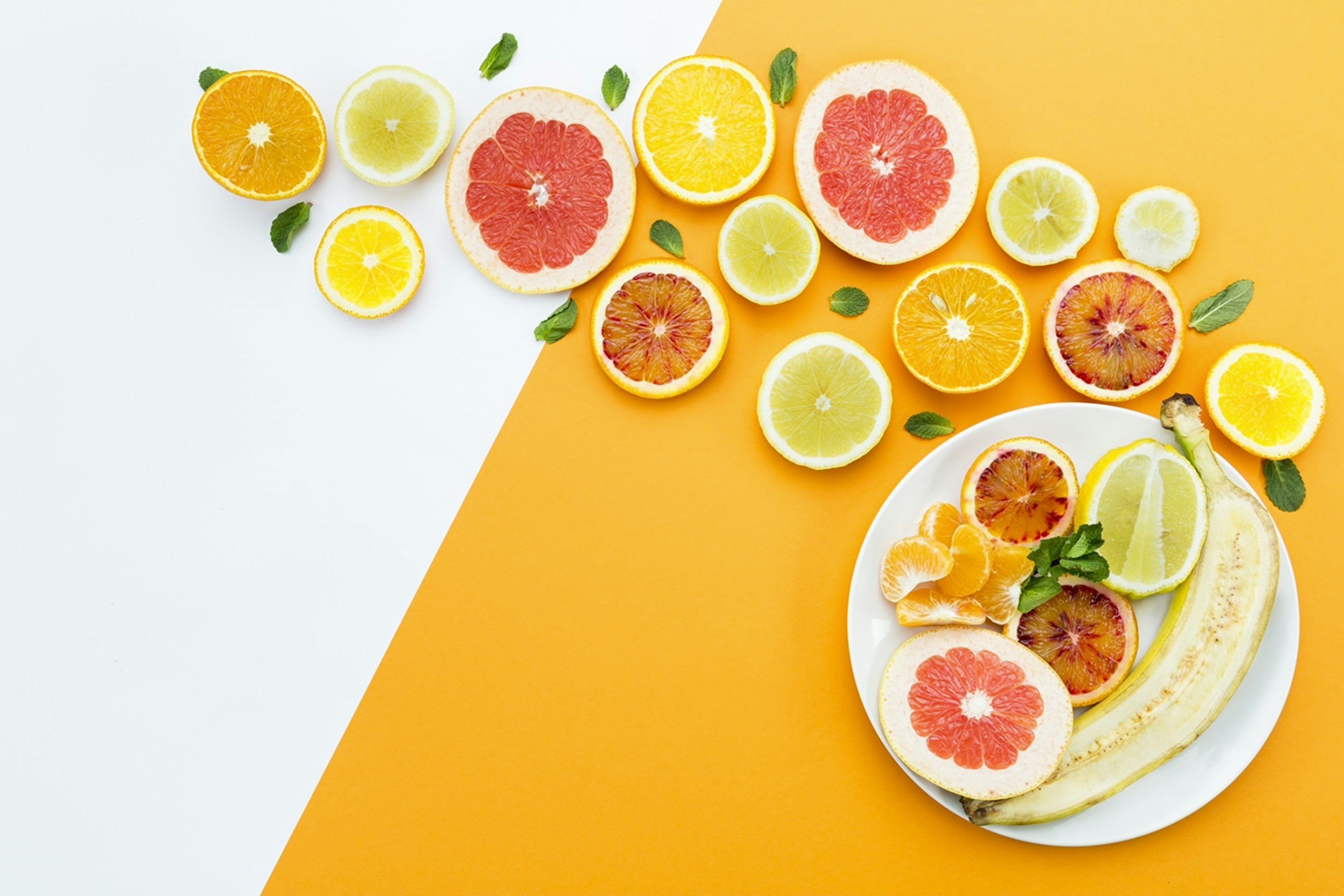 Slices of different citrus fruits