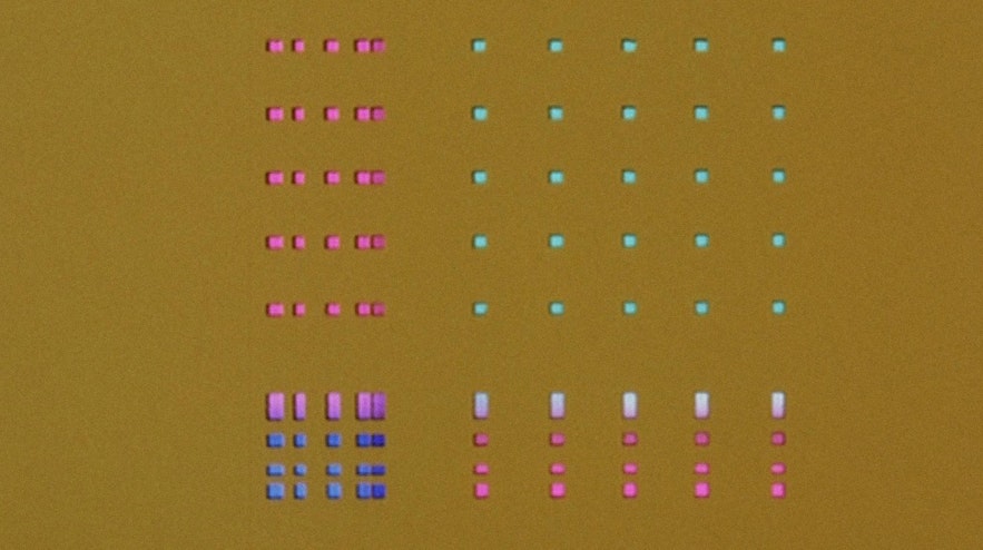 A series of pink, green, white, lilac and blue oblongs and squares on a tan background.