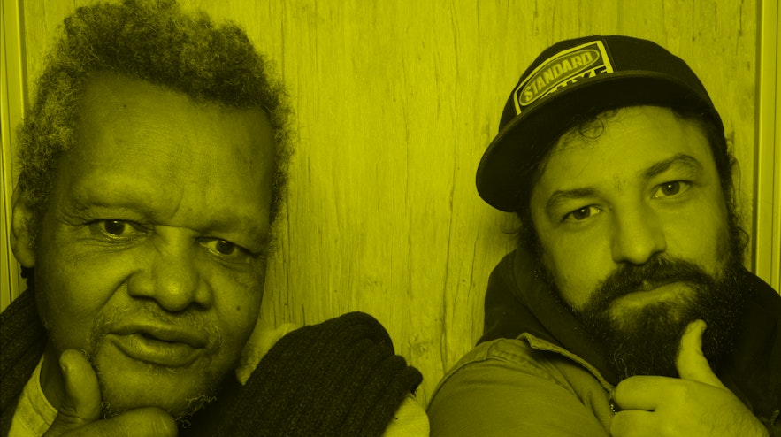 Two people in a photo booth