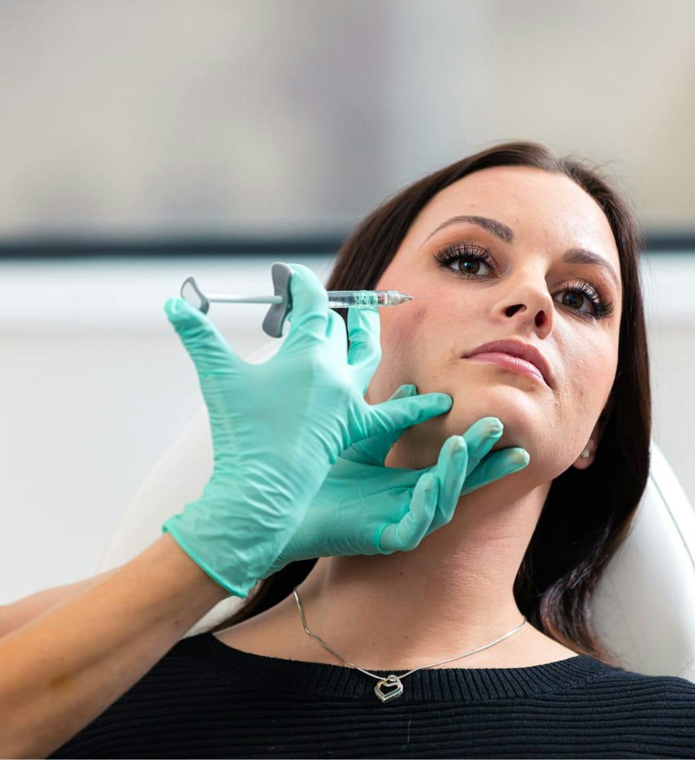Woman receiving Juvederm treatment at Eleve Medspa.