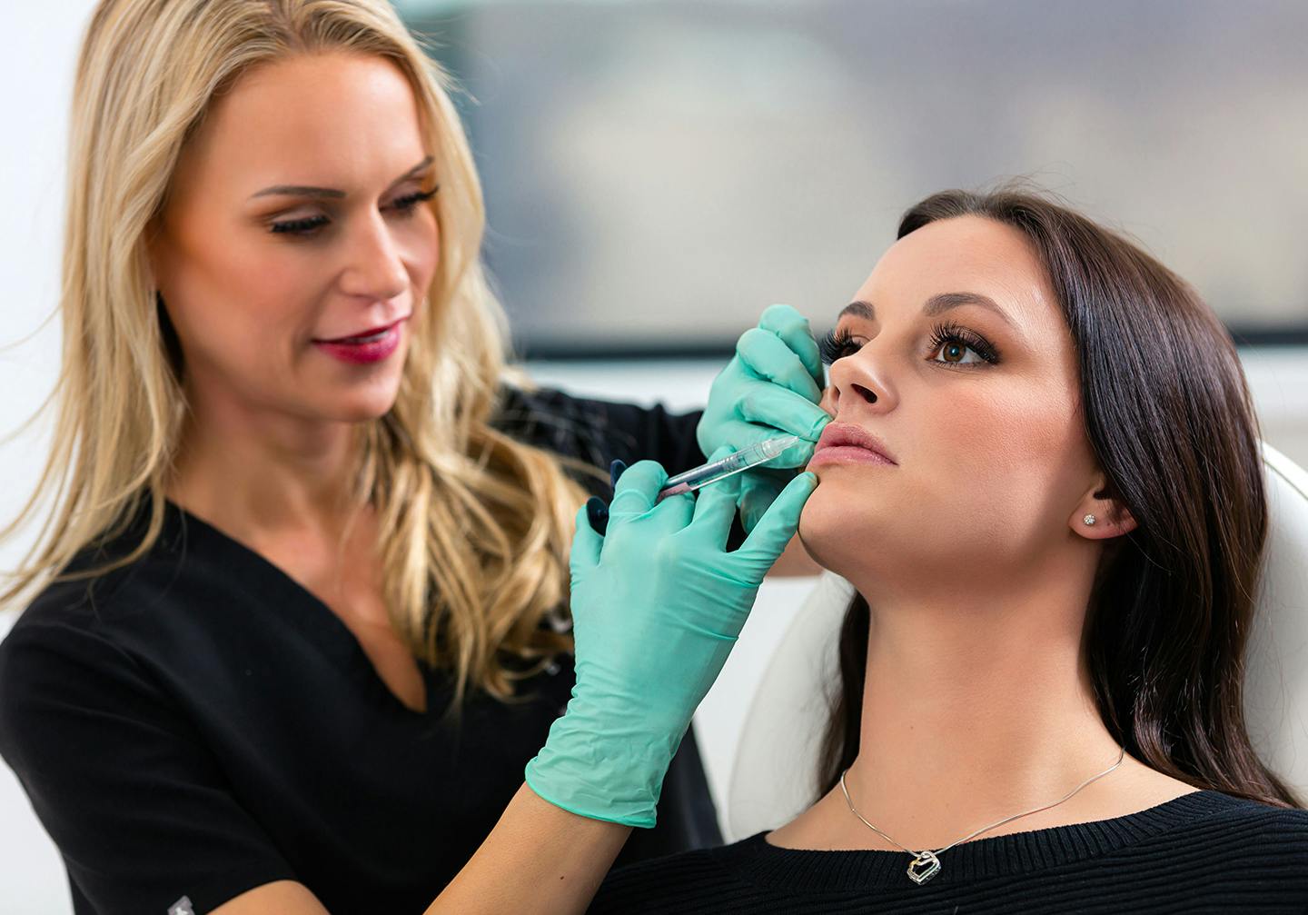 Woman receiving injectable treatment