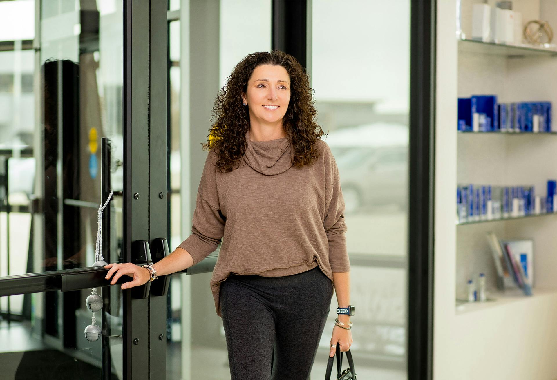 Woman in a brown long sleeve