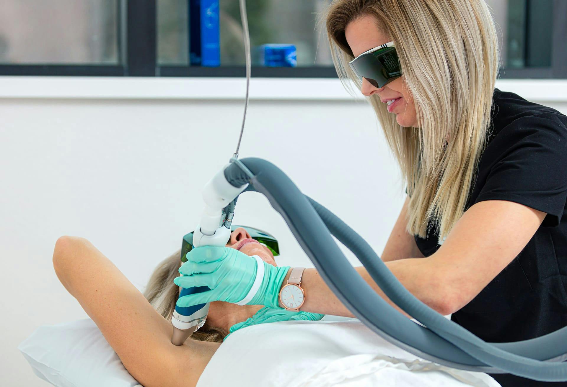 Woman receiving laser treatment