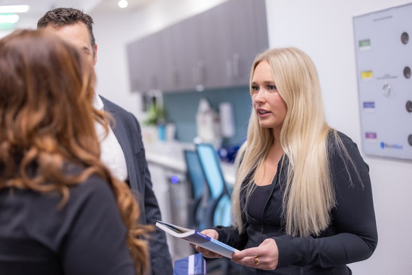 Staff members speaking