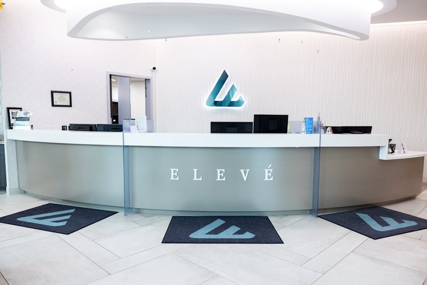 Front desk reception area of Eleve with curved desk
