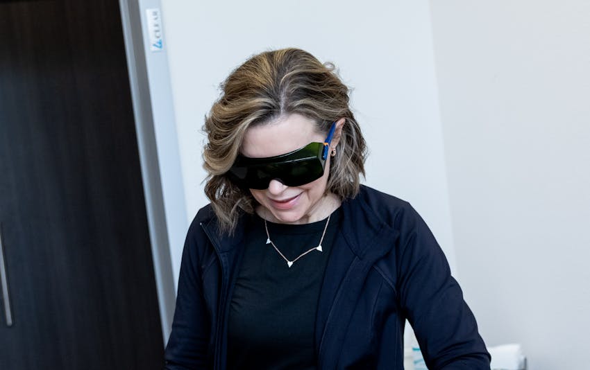 Women wearing protection glasses for laser treatment