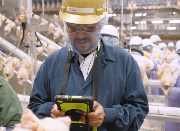 Supervisor using digital plant management from SafetyChain on a tablet