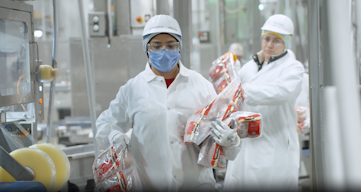 Person working in a poultry processing facility