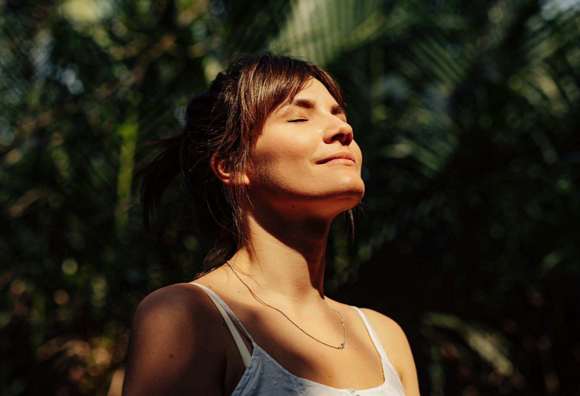 Woman with her eyes closed