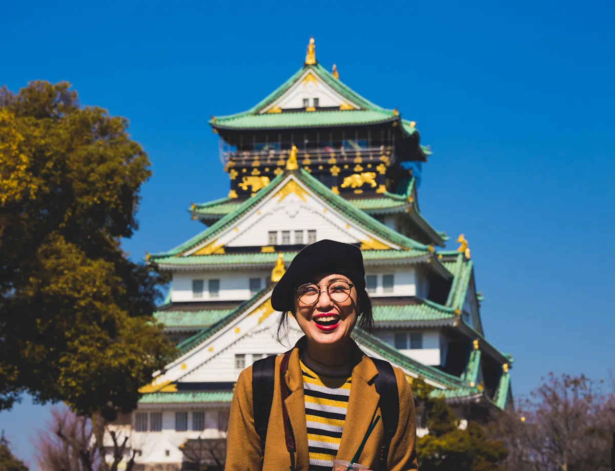 Woman in front of Osaka Castle Woman in front of Osaka Castle