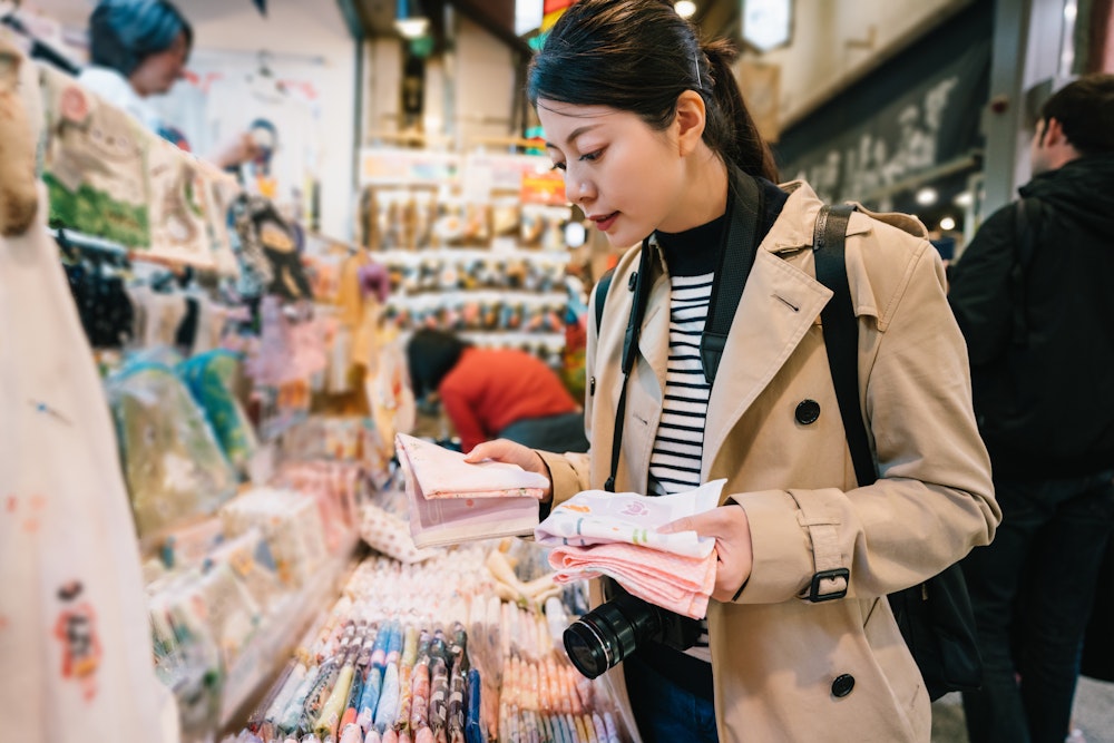 Woman buying souvenirs