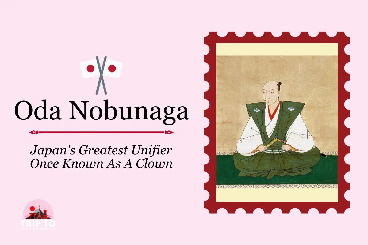A stylized image featuring an illustration of Oda Nobunaga, dressed in traditional Japanese attire, sitting cross-legged. Text on the left says, "Oda Nobunaga," "Japan's Greatest Unifier," and "Once Known As A Clown." Above the text are two crossed Japanese flags.