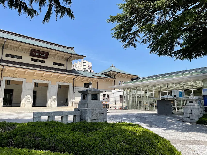 Visitors exploring the exhibits at Yūshūkan War Museum, one of the significant World War II memorial sites in Japan