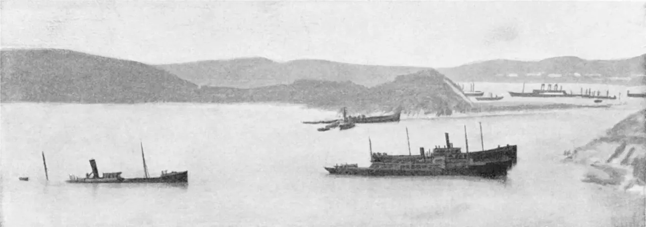 A black and white image of Sunken Japanese blockading ships at Port Arthur harbor during the Russo-Japanese War, 1904–05