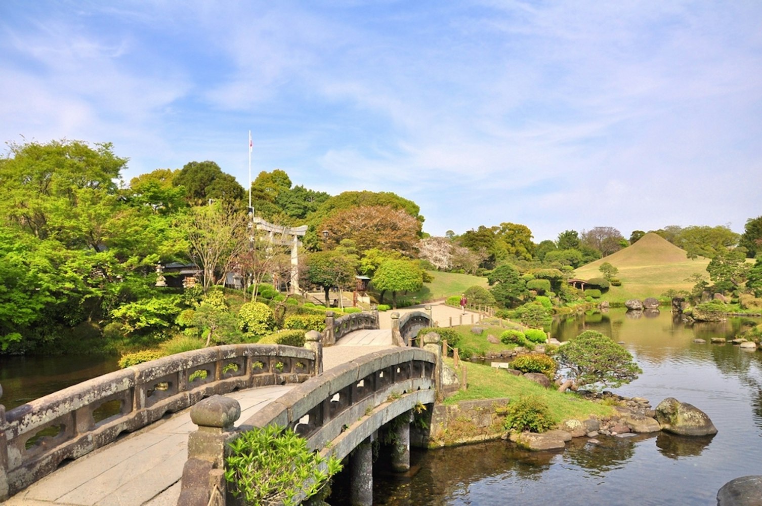 Stone bridge in Suizen-ji Joju-en garden at Kumamoto, Kyushu, Japan