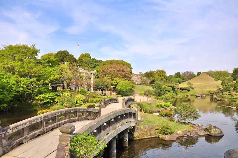 Stone bridge in Suizen-ji Joju-en garden at Kumamoto, Kyushu, Japan Stone bridge in Suizen-ji Joju-en garden at Kumamoto, Kyushu, Japan