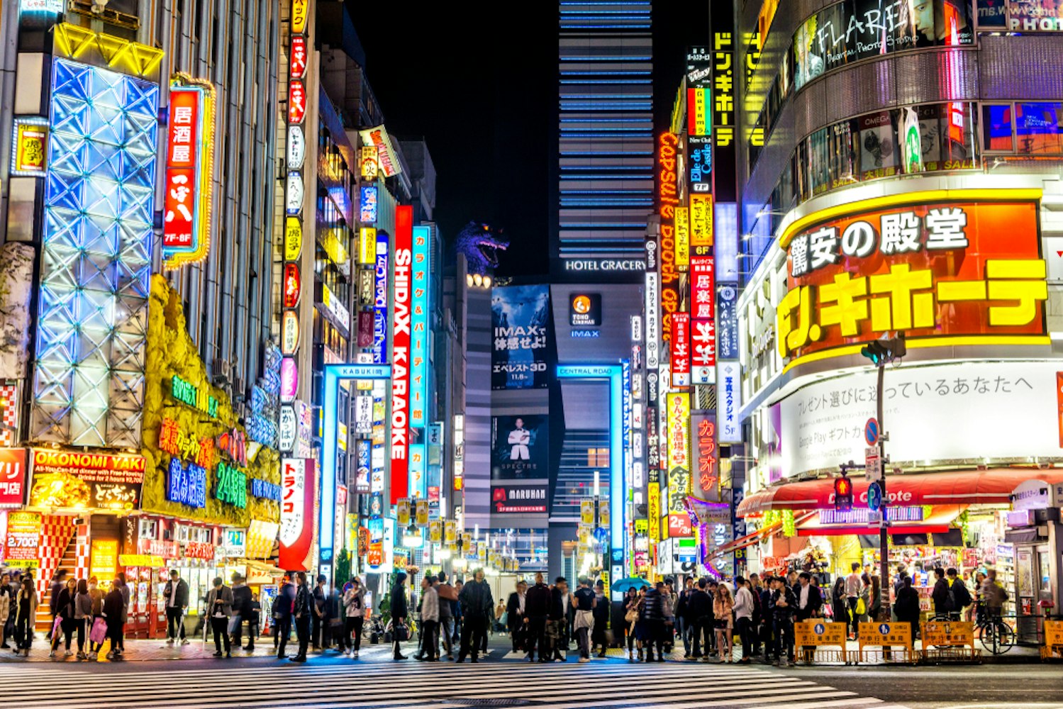 Shinjuku Neighborhood Illuminated by Neon Signs at Night