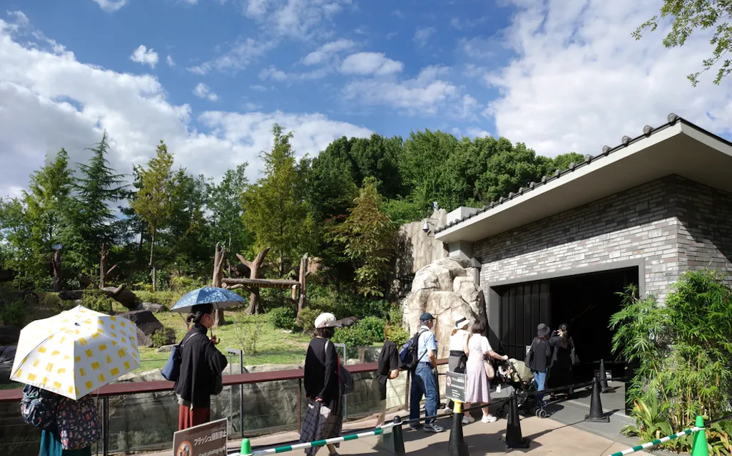 People enter the panda exhibit called "Panda No Mori" at Ueno Zoo Panda No Mori