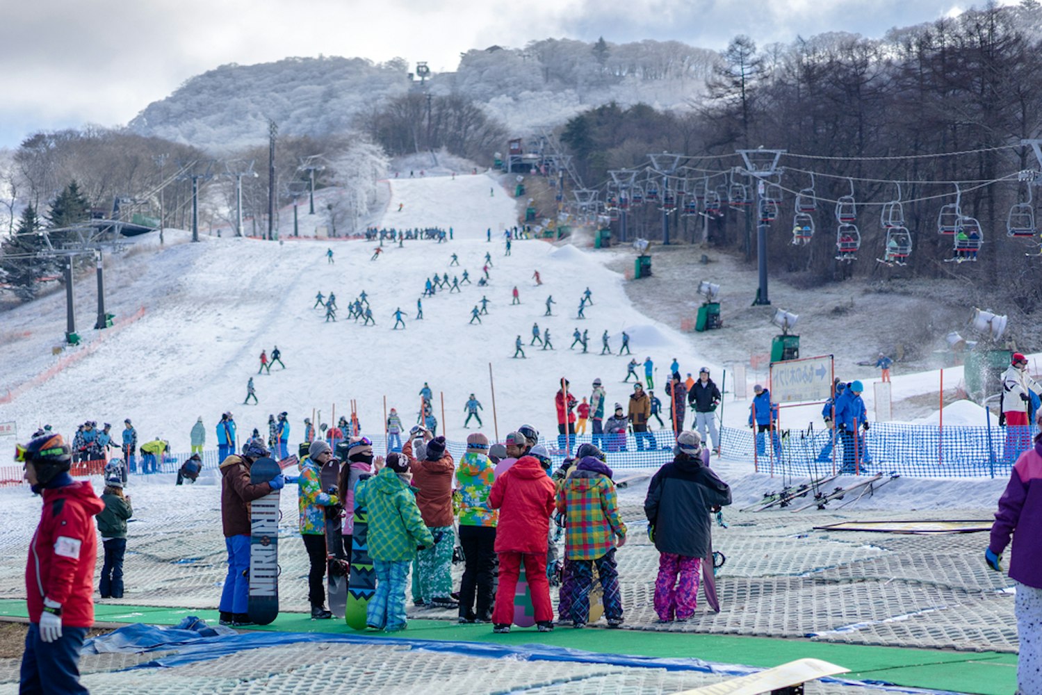 People Enjoy on the Snow and Ski Slopes