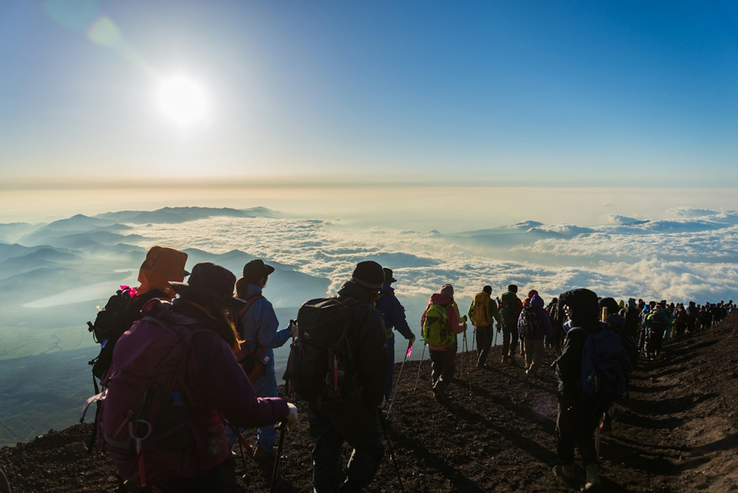 Hikers Gather During Sunrise on the MT. Fuji