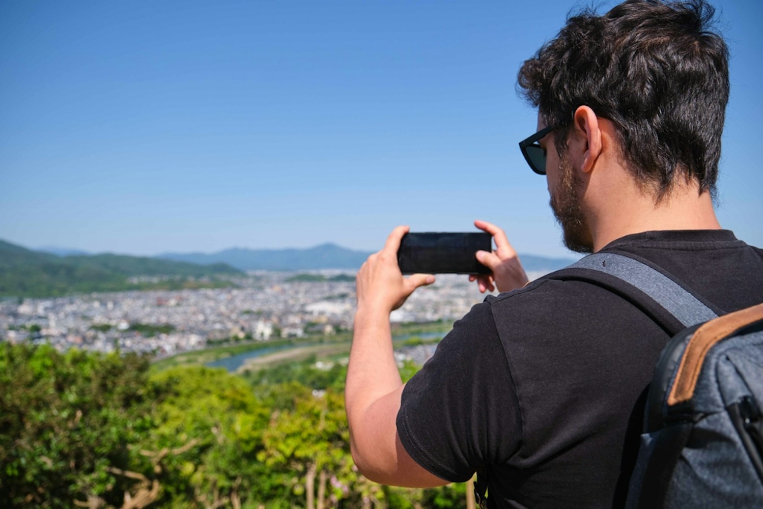 Tourist Taking a Photography of Kyoto City
