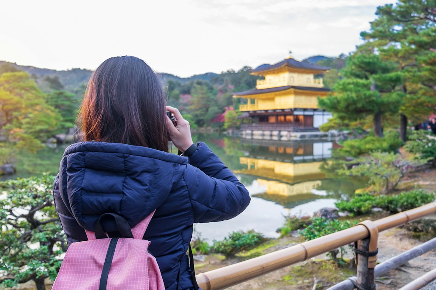 Solo Woman Tourist Taking Photo