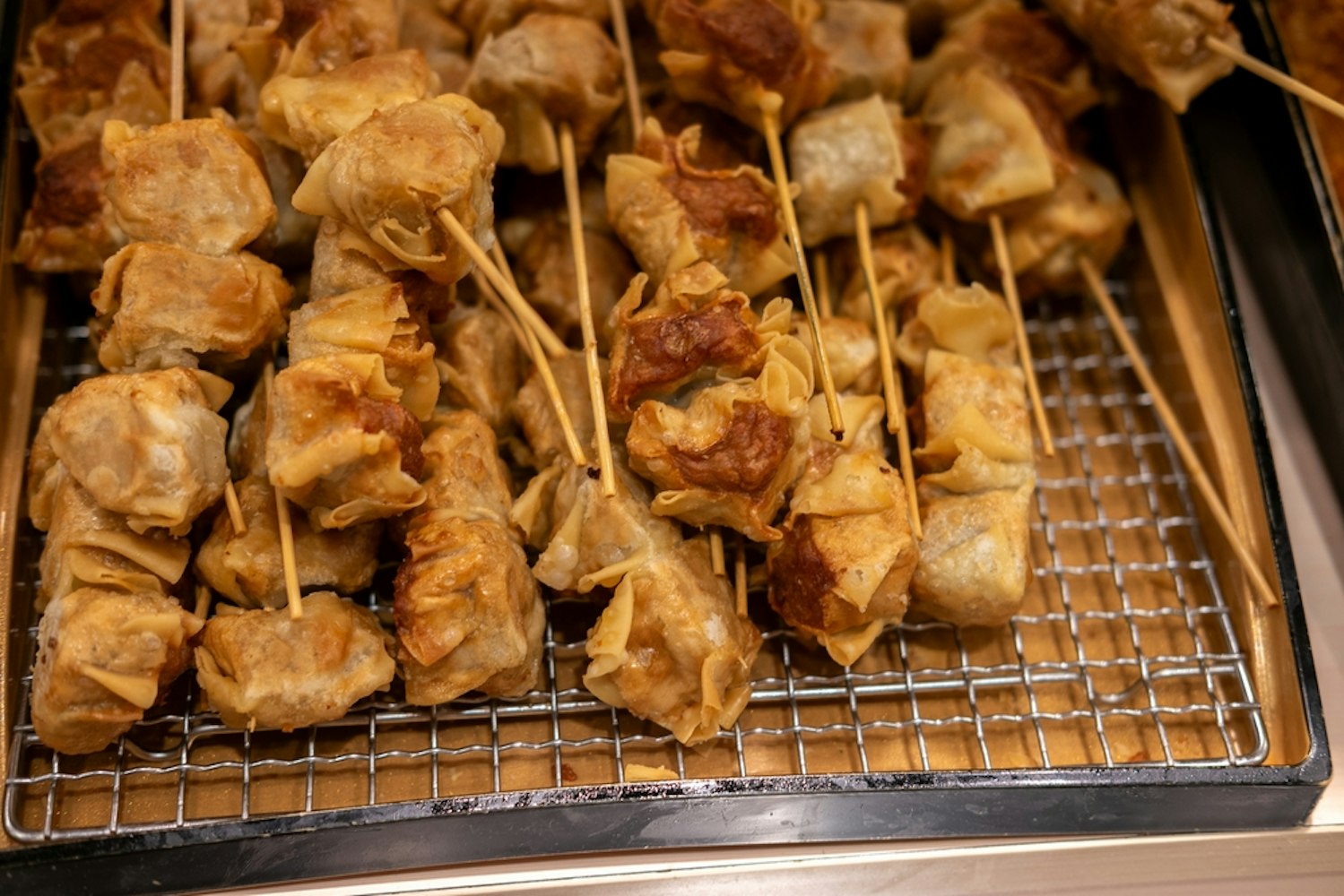 Kushikatsu, Delicious fried skewers with authentic wasabi served on a iron plate