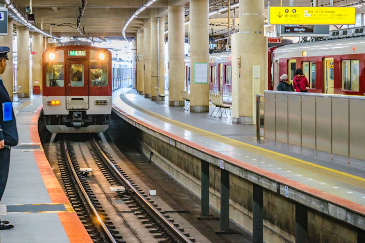 Train arriving at subway metro line station, Osaka, Japan Train arriving at subway metro line station, Osaka, Japan
