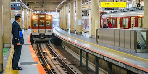 Train arriving at subway metro line station, Osaka, Japan
