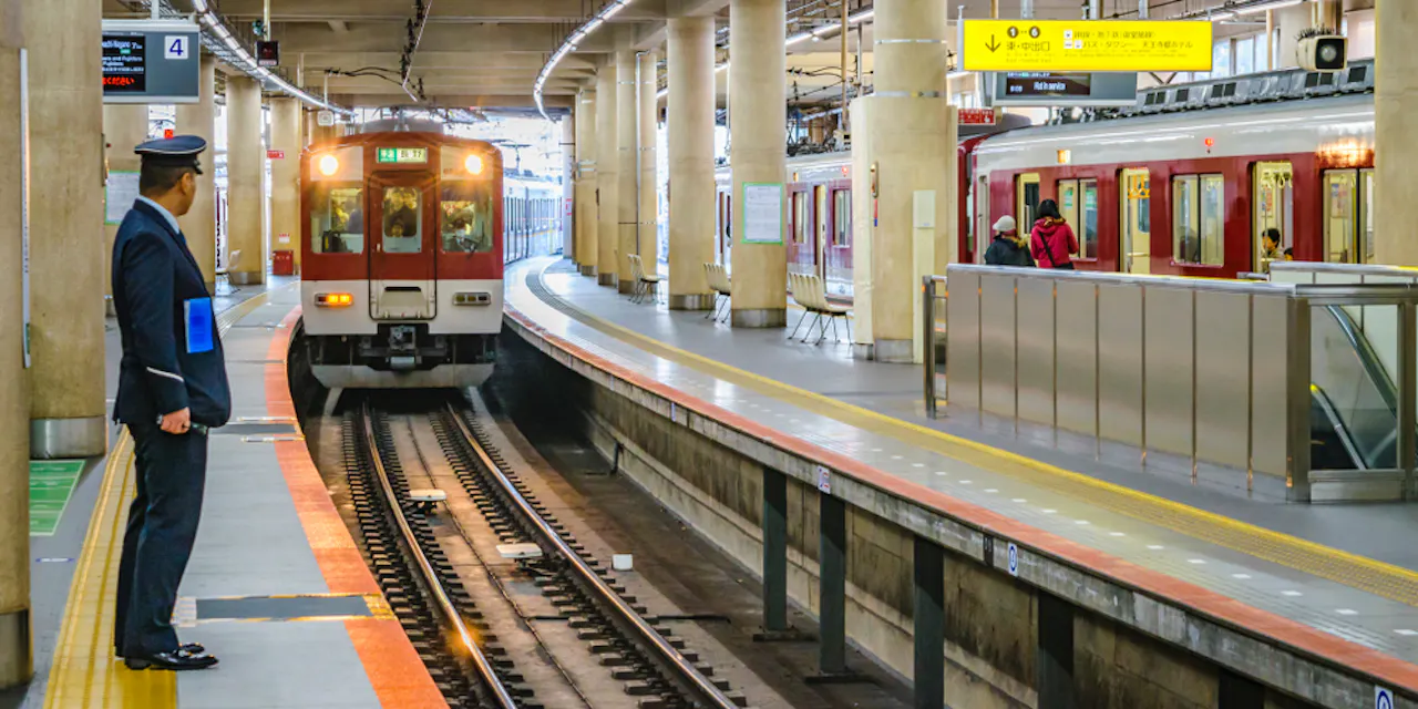 Train arriving at subway metro line station, Osaka, Japan