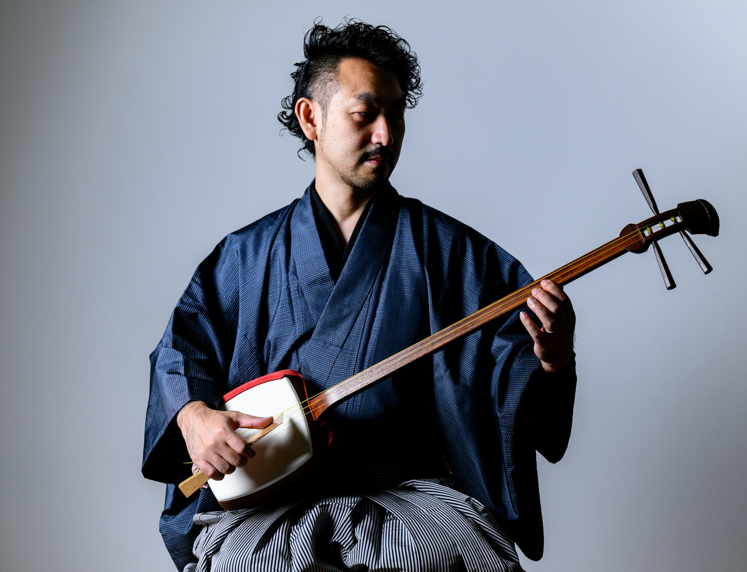 Playing Shamisen Playing Shamisen