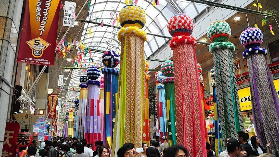 A lively shopping mall adorned with enchanting Japanese decorations for the Tanabata Festival.
