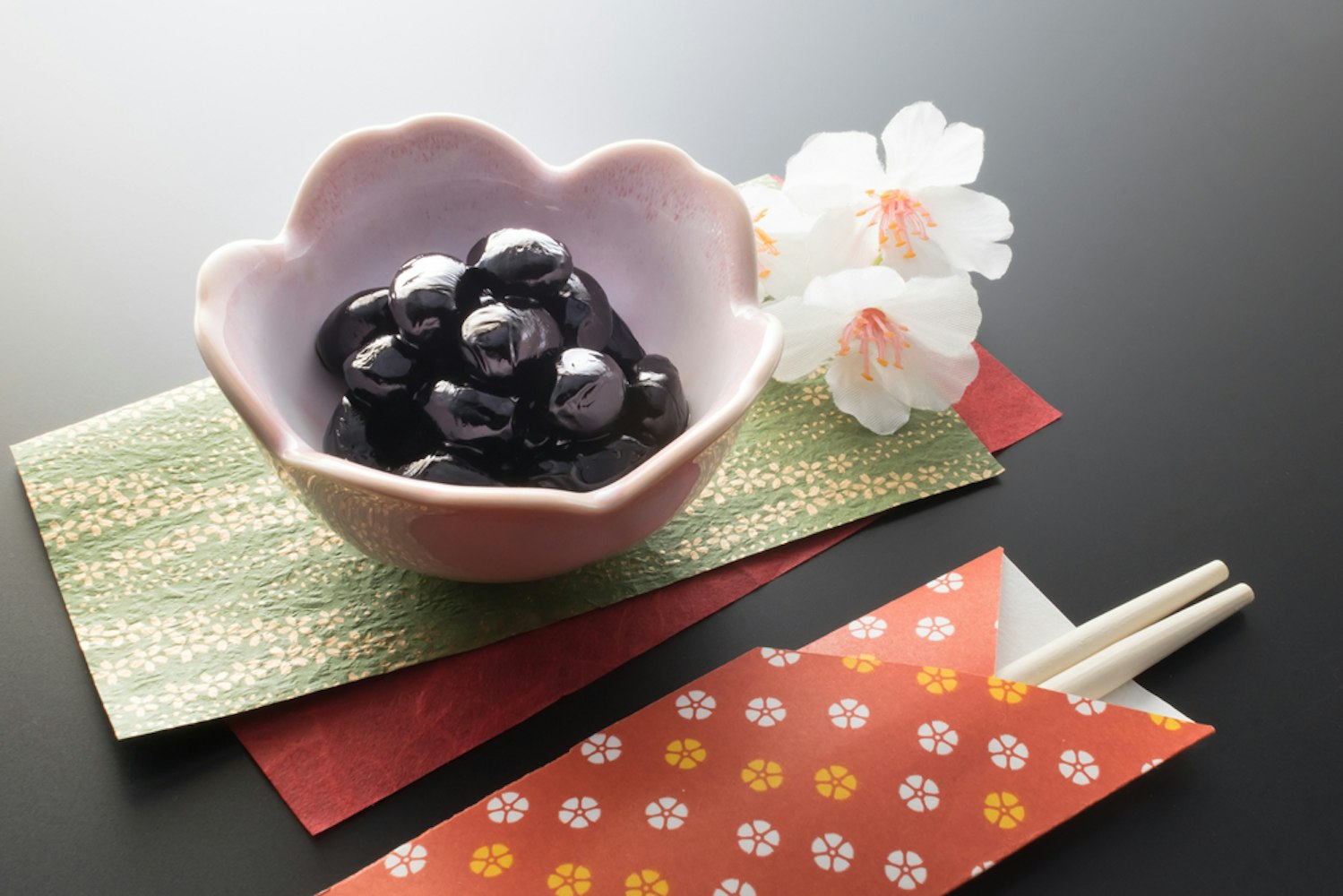 Kuromame with chopsticks