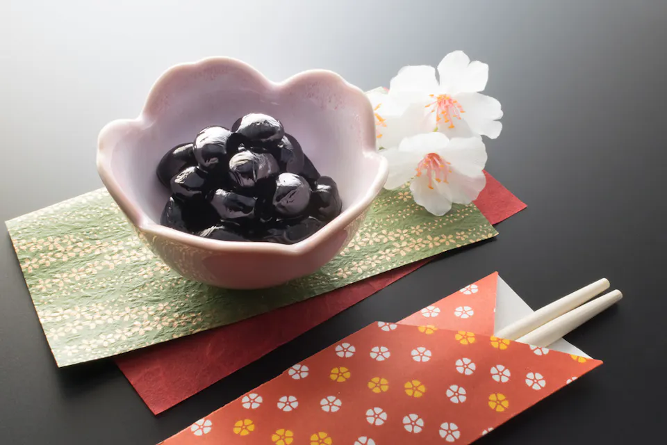 Kuromame with chopsticks