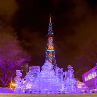 Snow sculpture of palace with Sapporo TV tower background in Sapporo Snow Festival Snow sculpture of palace with Sapporo TV tower background in Sapporo Snow Festival