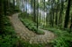 Walking the cobblestone road following the Nakasendo trail between Tsumago and Magome in Kiso Valley, Japan