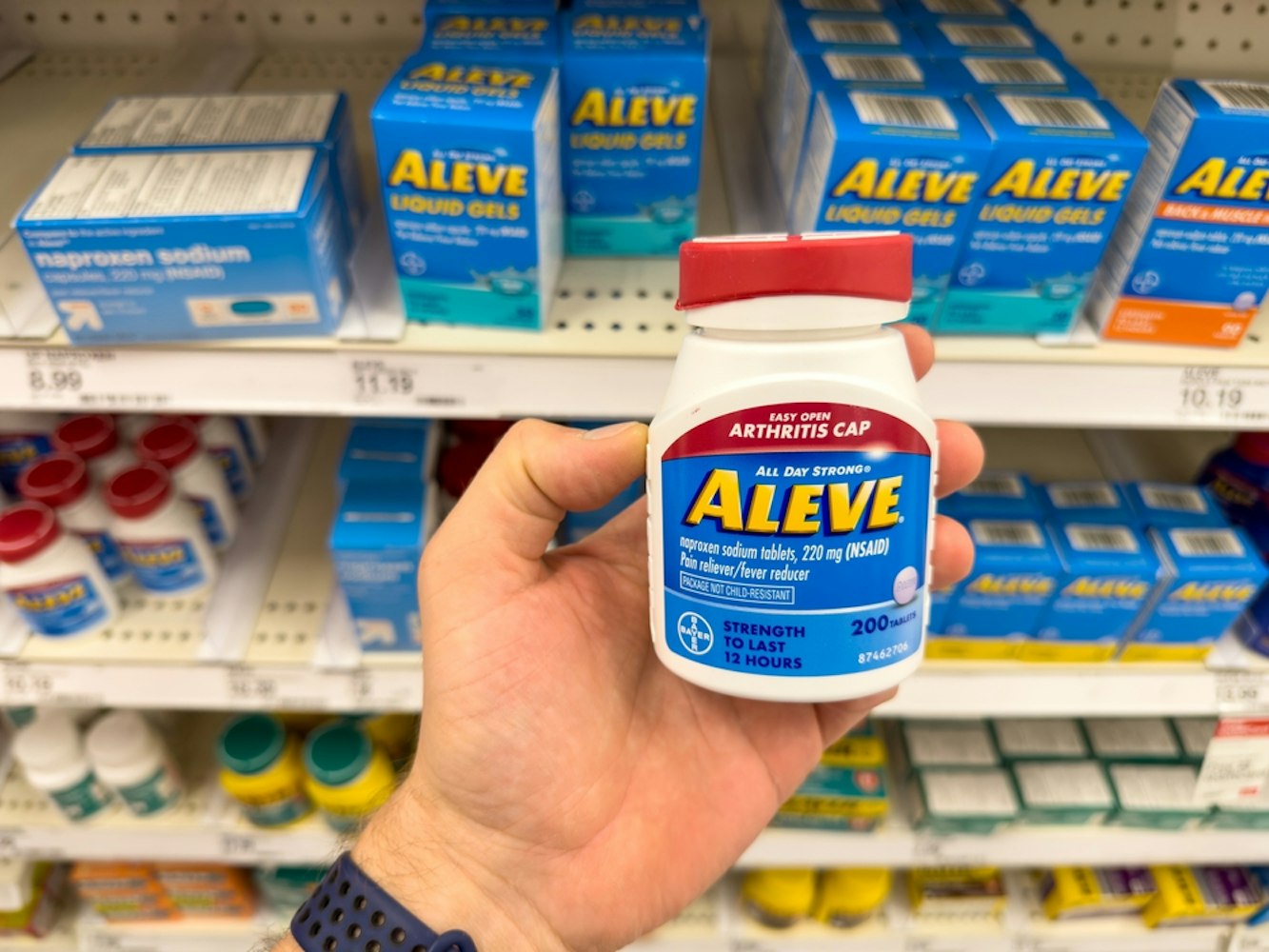 Small bottle of Aleve NSAID naproxen sodium tablets by Bayer