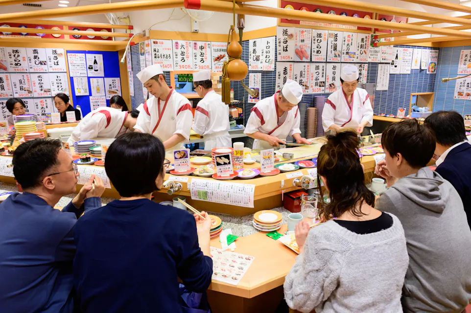 Inside view of conveyor belt sushi restaurant in Fukuoka Inside view of conveyor belt sushi restaurant in Fukuoka
