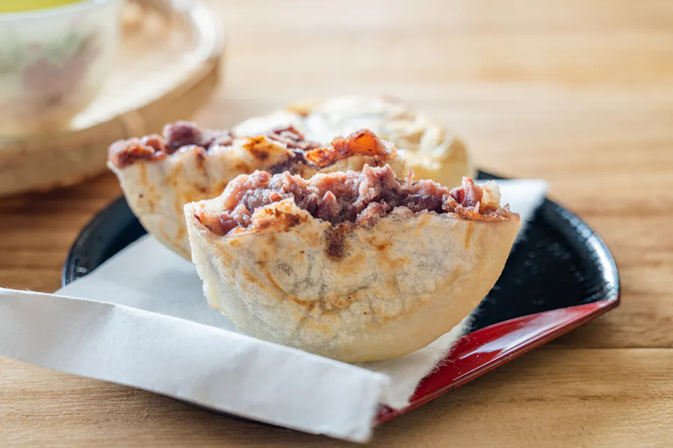Dazaifu's specialty, Umegae Mochi, split in half