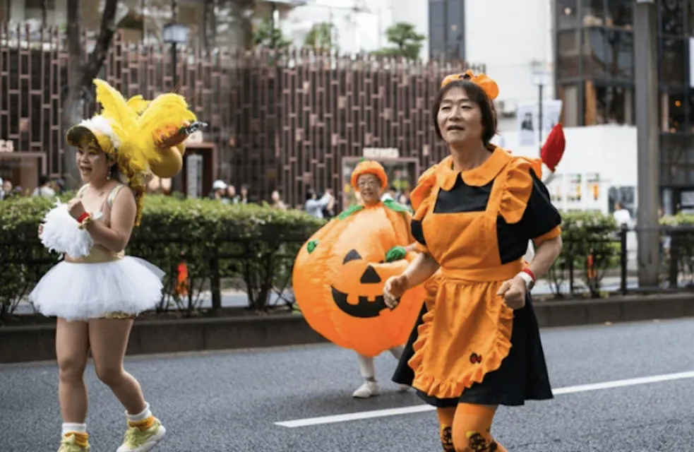 Japanese people dressed up in pumpkin Omotesando Halloween in Tokyo