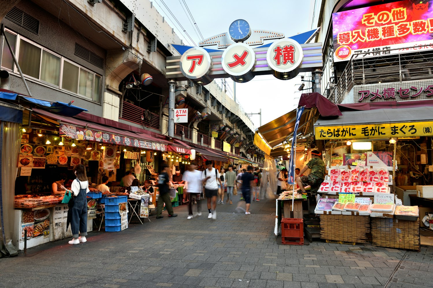 A view under the Ameyoko guardrail lined with small shops