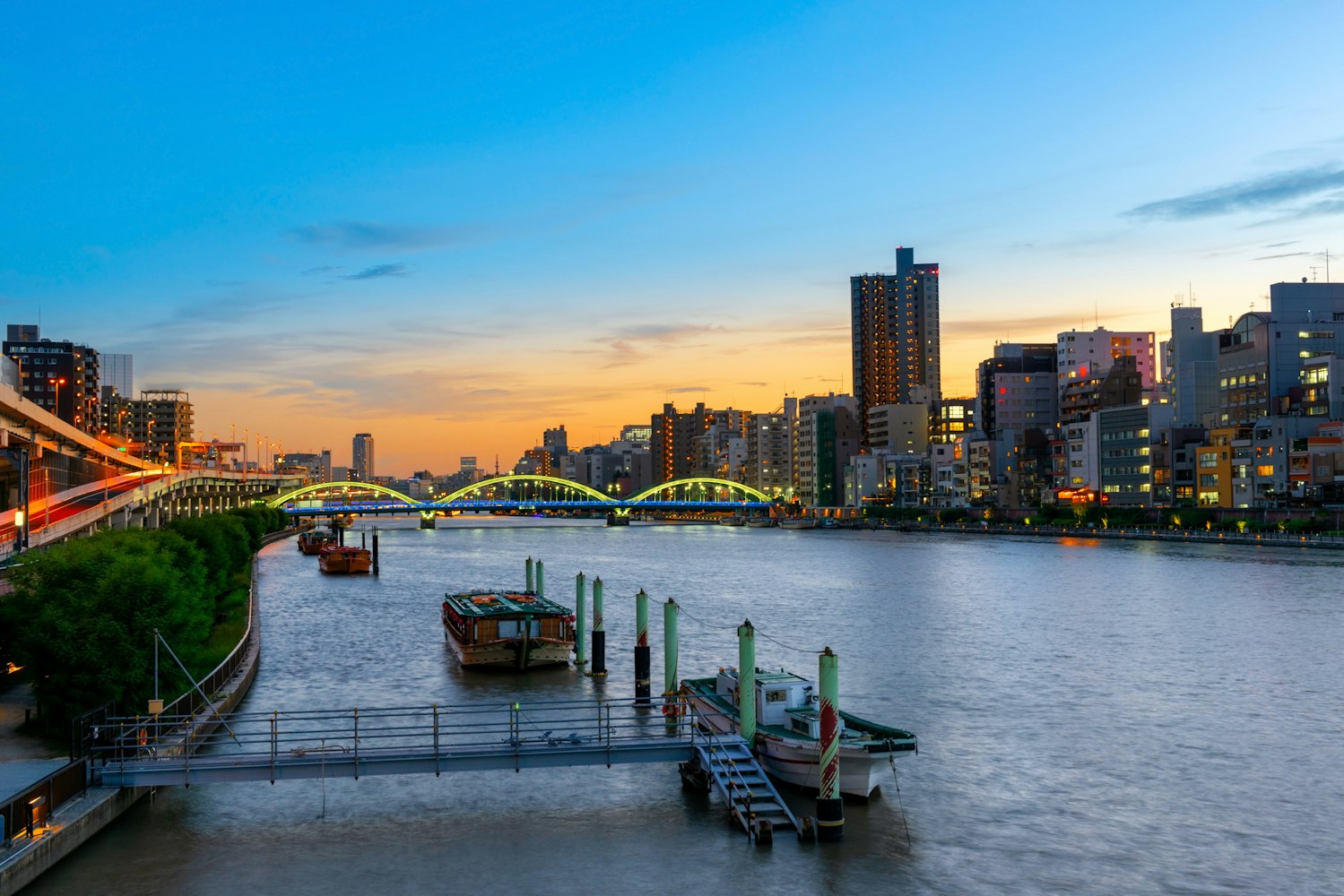 evening scene of Sumida river Yakatabune boats