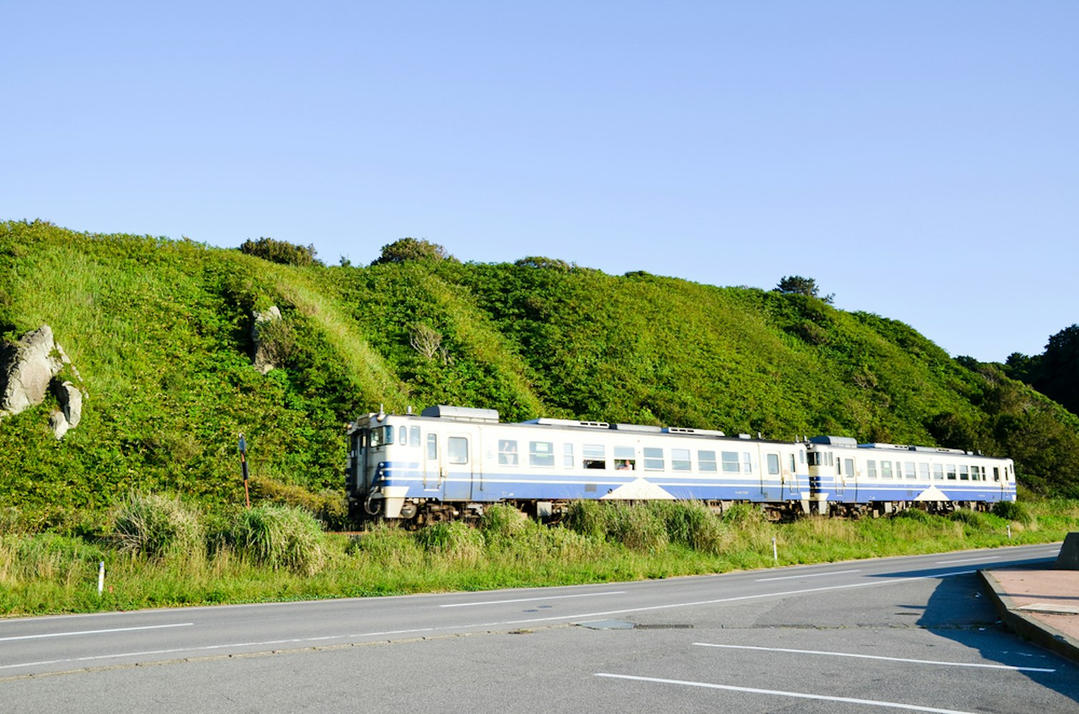 Train of Gono Line at Fukaura Senjojiki, Aomori, Japan