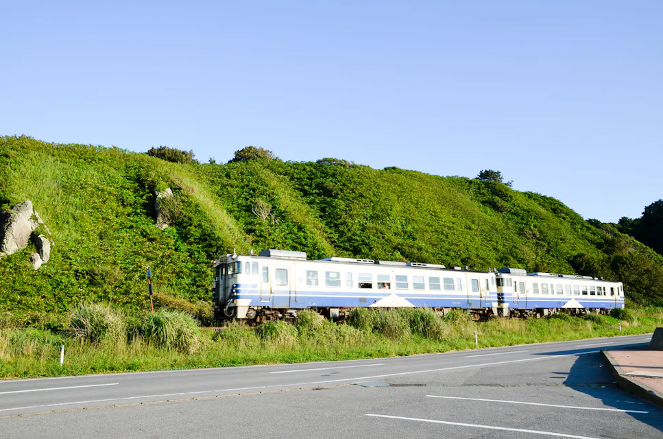 Train of Gono Line at Fukaura Senjojiki, Aomori, Japan